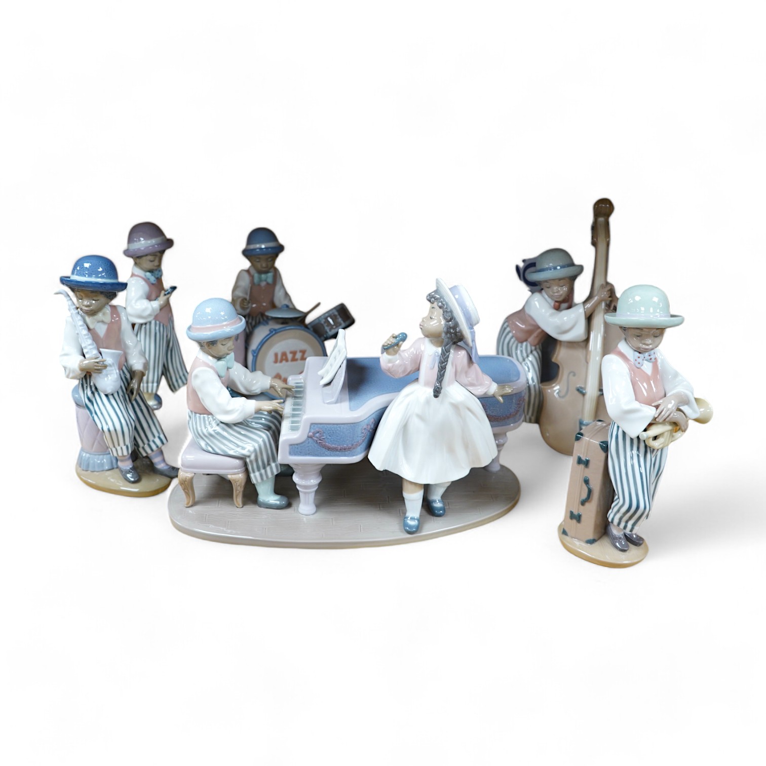 A Lladro group of six ‘Jazz Band’ figures, tallest 25cm. Condition - good